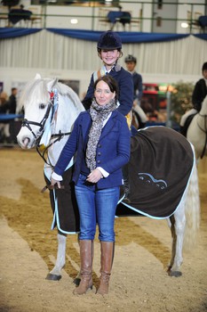 Suffolk young showjumper Kelly Wecke takes the Animo Novice Pony Championship title as her own